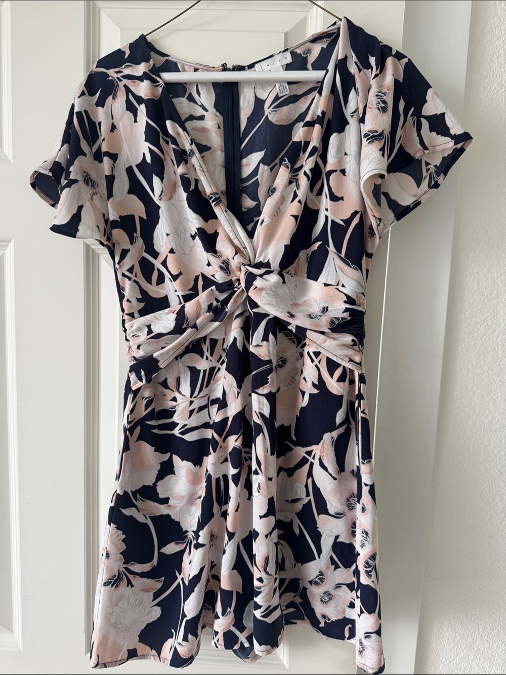 Navy and Blush Floral Twist-Front v-neck romper